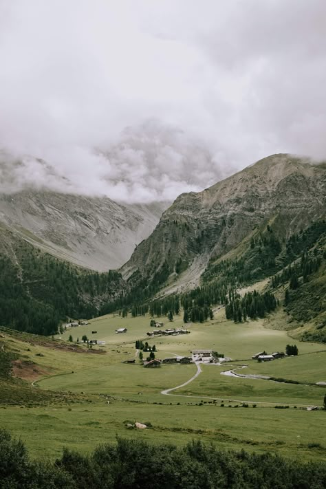 One Plus Cover, Alpine Mountains Landscapes, Foggy Mountain Aesthetic, Mountain Village Aesthetic, Mountain Town Aesthetic, Small Village Aesthetic, Foggy Village, European Mountains, Klosters Switzerland