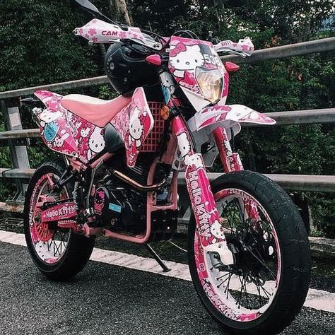 Hello Kitty bike Hello Kitty Skateboard Aesthetic, Hello Kitty Motorbike, Hello Kitty On A Skateboard, Motorcycle Pink Aesthetic, Pink Hello Kitty Motorcycle, Hello Kitty Bike, Pink Grunge Aesthetic, Pink Grunge, Motorcycle Tattoos