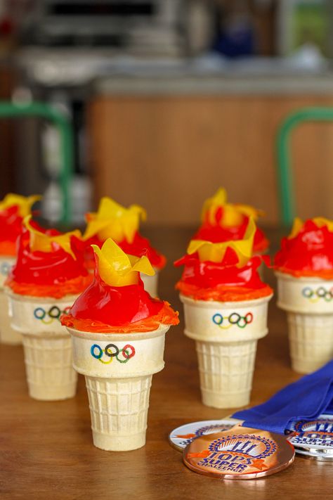 Torch Cupcakes, Olympic Party Food, Olympic Food, Olympic Theme Party, Olympic Games For Kids, Olympics Party, Kids Olympics, Olympic Crafts, Cone Cupcakes