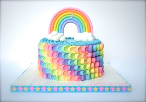 Rainbow Birthday Cake - Buttercream Petal Cake in rainbow colors.  Rainbow and clouds are gumpaste.  TFL! Rainbow And Clouds, Petal Cake, Rainbow Birthday Cake, Rainbow Birthday, Rainbow Cake, A Rainbow, Rainbow Colors, Frosting, Birthday Cake