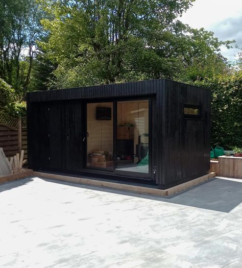 Yakisugi is the Japanese process of charring timber to create this deep black and sustainable cladding option. It adds sustainability, longevity and charm. It’s one of our most popular cladding options and it really looks great on our OKOPOD garden rooms. Contact us for more information info@okopod.com #yakisugi #extension #homeextension #gardenroom #gardenoffice #gardenpod #gardenretreat #gardenstudio #gardenhangout #homeoffice #office #wfh #workfromhome #prefab #annexe #annex #tinyhome #... Black Garden Room, Garden Office Shed, Exterior Garden, Office Shed, Garden Pods, Charm It, Black Garden, Garden Rooms, Garden Studio