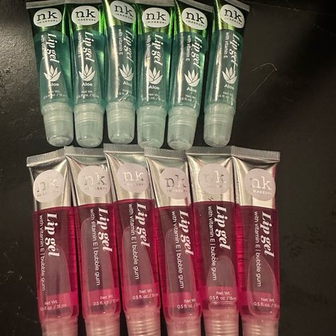 This Lipgloss Is Lightweight And Hydrating, Nk Lip Gel Provides A Mirror Finish That Glides On Effortlessly. It Goes On Clear With Our Gel Delivers A Hint Of Color Still Very Wearable Of The Bottle Shade With A Non-Stick Finish. All 12 Lipglosses Will Be Sold As Wholesale. 6 Pink Bubble Gum Flavored And 6 Green Aloe Vera. These Lipglosses Are Sealed And In Brand New Condition. I Also Sale More Wholesale Makeup And Skincare. Makeup Items Can Be Bundled With Other Products For A Better Deal. Weird Makeup Products, Nk Lip Gloss, Nk Lip Gel, Lipgloss Collection, Lip Gel, Lip Gloss Balm, Lip Balm Collection, Best Lip Gloss, Wholesale Makeup