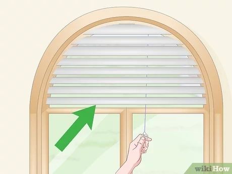 3 Ways to Cover Arched Windows - wikiHow Arch Window Covering Ideas Bedroom, Arch Window Blinds, Rounded Window Curtains, Blinds For Arched Windows, Half Circle Window, Arched Window Coverings, Half Moon Window, Curtains For Arched Windows, Arched Window Treatments