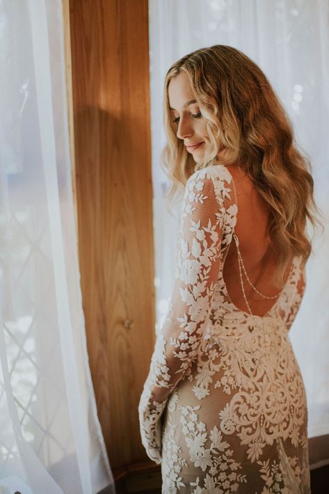 Modern boho bride wearing lace Liz Martinez wedding gown with long sleeves and plunging back Liz Martinez Bridal, Boho Couple, Dramatic Wedding Dress, Liz Martinez, Gown With Long Sleeves, Festival Style Wedding, Black Tie Attire, Strapless Wedding Gown, Princess Wedding Dress