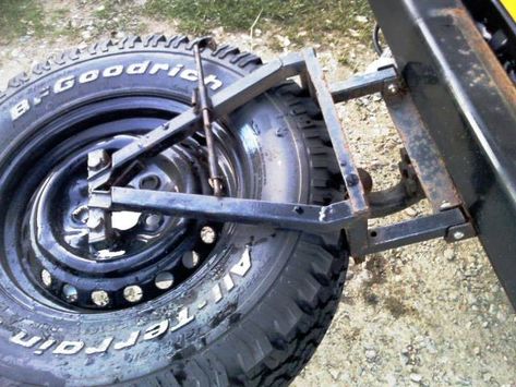 Fold down spare wheel mount. Aksesoris Jeep, Accessoires 4x4, Jeep Wj, T3 Vw, Cool Truck Accessories, Expedition Trailer, Wheel Carrier, Truck Flatbeds, Jeep Camping