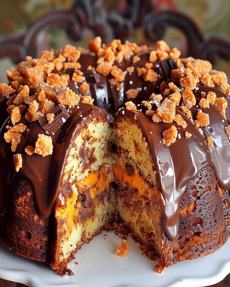 Discover how to make a Butterfinger Bundt Cake filled with caramel, chocolate chips, and topped with a rich drizzle for an irresistible dessert. Chocolate Caramel Bundt Cake, Chocolate Cake Mix Bundt Cake Recipes, Bundt Cakes With Filling, Butterfinger Bundt Cake Recipe, Thanksgiving Bundt Cake Ideas, Butterfinger Bundt Cake, Senior Cakes, Turtle Bundt Cake, Chocolate Bundt Cakes