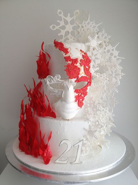 Birthday Cakes - Fire and Ice themed cake.  The flames are isomalt and the snowflakes are gumpaste and isomalt. The mask is gum paste as well . I covered the tiers with sanding sugar to give it that icy look and poured clear isomalt on edges as well. Banquet Desserts, Isomalt Cake, Masquerade Cake, Masquerade Cakes, Ice Mask, Interesting Cakes, Ice Party, Sanding Sugar, Cake Wrecks