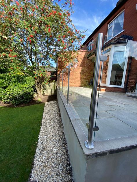 These Leeds based customers wanted a glass balustrade that would prevent their grandchildren falling from their decking whilst also look fabulous and we think this Post and Rail Viola Glass Balustrade does just that. #Inspiration #Glassdesign #Balcony #Outdoor #OriginArchitectural #Glass #GlassBalustrades #GlassFence #GardenGlassBalustrade #GlassFencing #ArchitecturalDesign #GlassBalcony #Balustrade #JulietBalcony #FramelessGlassBalustrade #Garden #DeckingBalustrade #GlassDeckingBalustrade Glass Fence Garden, Patio Balustrade Ideas, Decking Glass Balustrade, Balustrade Design, Garden Renovation, Garden Railings, Patio Railing, Glass Hardware, Raised Deck