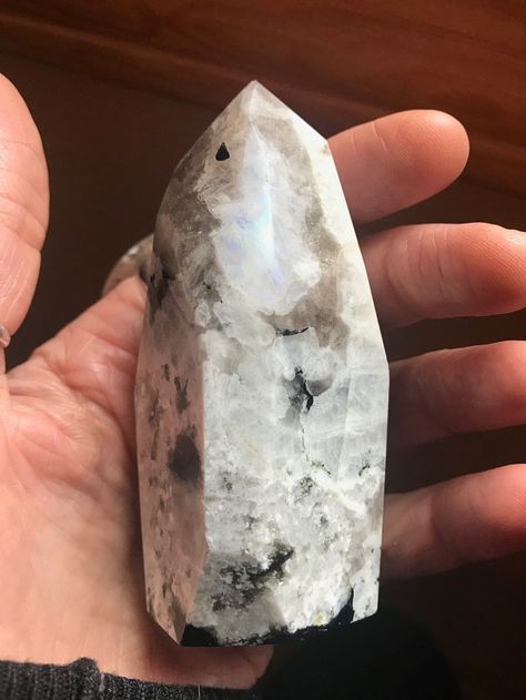 Moonstone is a favorite and very popular crystal. It's one that many of us are attracted to for its trademark blue flash.  Everybody loves that inner sparkle right?  Today, we're going to talk all about moonstone's healing properties, correspondences, and meanings. #moonstone #crystals #crystalmenaings #crystalhealing #crystalcorrespondences #wellness #selfcare #lunarenergy #goddess #divinefeminine #intuition #energyhealing Moonstone Crystal Meaning, White Moonstone Crystal, Moonstone Healing Properties, Moonstone Properties, Wellness Selfcare, Black Labradorite, Black Moonstone, Goddess Energy, Rainbow Light