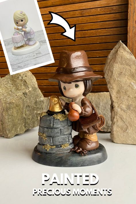 We transformed a Precious Moments figurine into an Indiana Jones tribute using clay and paint. See how we do it! #notsopreciousmoments #alteredmoments #preciousmoments #indianajones Painted Precious Moments, Altered Precious Moments, Precious Moments Dolls, Sand Bag, Homemade Art, Precious Moments Figurines, Diy Upcycle, Indiana Jones, Precious Moments