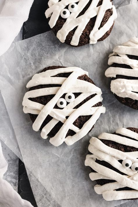 These paleo Halloween cookies are the perfect addition to your Halloween party planning. These dairy free gluten free cookies are so festive and fun! They're both adult and kid friendly. Mummy cookies are super easy to make and turn out perfect every time. You'll love these easy paleo chocolate cookies for any holiday occasion. The maple frosting on top is simple to throw together and the perfect compliment to these Halloween cookies. #simplyjillicious #halloween #cookies Paleo Halloween Treats, Paleo Halloween, Paleo Chocolate Cookies, Mummy Cookies, Easy Halloween Cookies, Halloween Party Planning, Maple Frosting, Dairy Free Gluten Free, Paleo Chocolate