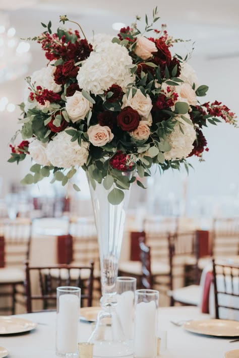 Burgundy Tall Centerpieces, Marsala Wedding Theme, Wine Colored Wedding Flowers, New Year’s Eve Colors, Champagne And Burgundy Wedding Flowers, Big Flower Centerpieces Wedding, Wedding Flowers Wine Color, Burgundy And Champagne Centerpieces, Wedding Centerpieces Maroon