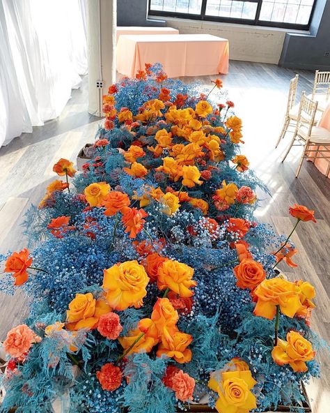 The colors in this piece 😍 can’t stop looking at this beaut from @textureflorals -“My love for orange flowers and anything-but-white linens continues. Yesterday’s sea of 🍅🍑🍊🌊 for Ada and Danny. Still can’t get over Ada’s dress and earrings!!! Thank you @feastyoureyescatering for being a pleasure to work with! It was so nice to meet you @landonwisephoto @sliceoflimephoto and have you in Philly! “ 💙🧡#thursd #thursdofficial #yourfloralmeetupspot Nicole Rossi, Orange Centerpieces, Blue Flower Arrangements, 70th Birthday Decorations, White Linens, Baby S Breath, Orange Wedding, Orange Roses, Blue Baby