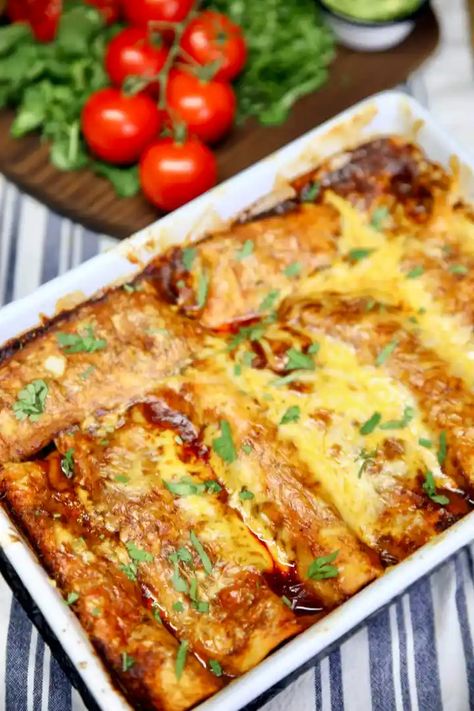 Brisket Enchiladas are stuffed with smoked brisket and cheese, a quick homemade enchilada sauce topped with a thick layer of melty cheese. An epic Tex-Mex dinner that will satisfy a hungry crowd. Leftover Brisket Enchiladas, Beef Brisket Enchiladas, Brisket Enchiladas Recipe, Brisket Enchiladas, October Recipes, Shredded Beef Enchiladas, Oregano Chicken, Beef Brisket Recipes, Creamy Chicken Enchiladas