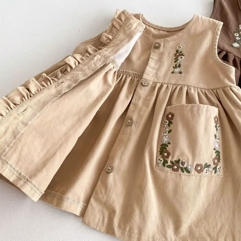 Product ID: BB51627  Material: 100% Cotton  Color: Khaki, Coffee, Beige      Dress Size Chart        Size (Age)    Height (CM)   Chest (CM)    Length (CM)       6-12M     67-75     54    42      12-18M     76-85     56    45      18-24M     86-95     58    48      2-3T     95-105     60    51      3-5T     105-115     62    54             Blouse Size Chart        Size (Age)    Height (CM)   Chest (CM)    Length (CM)       6-12M     67-75     54    34      12-18M     76-85     56    36      18-24M     86-95     58    38      2-3T     95-105     60    40      3-5T     105-115     62    42      *Babies grow at their own pace. It's recommended to choose the size that corresponds to your mini's height and weight rather than their age for a much more accurate fit. Please also take delivery time Toddler Dress Up, Baby Dress Embroidery, Flower Embroidered Dress, Cute Baby Dresses, Kids Dress Collection, Kids Frocks Design, Sewing Baby Clothes, Kids Dress Wear, Baby Clothes Girl Dresses