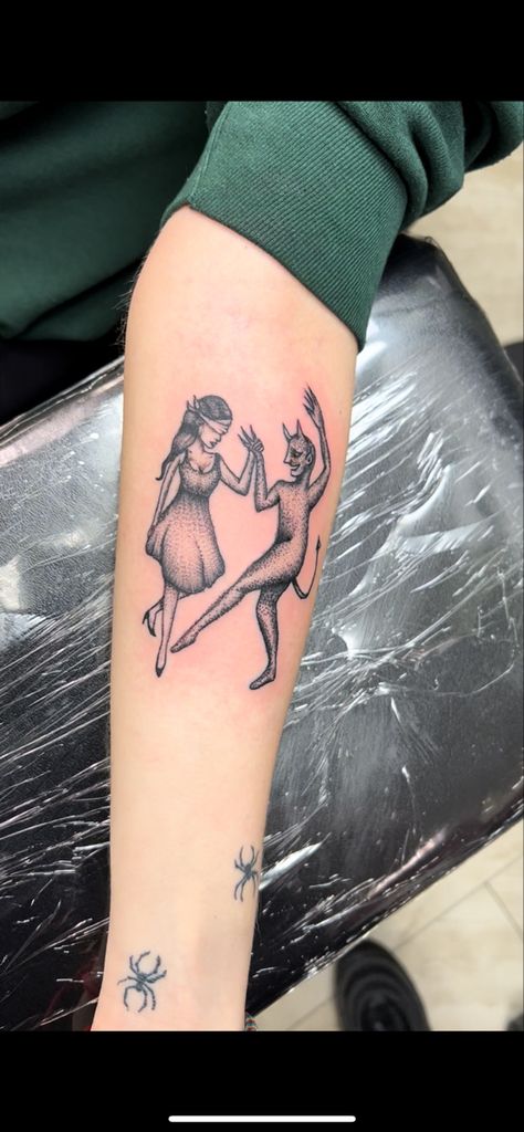 Dancing with the devil tattoo. A blindfolded women dancing with the devil. Woman With Blindfold Tattoo, Dance With The Devil Tattoo, Blindfolded Woman Tattoo, Blindfold Tattoo, Devil Tattoo For Women, Dancing With The Devil Tattoo, Cute Devil Tattoo, Small Devil Tattoo, Temptress Tattoo