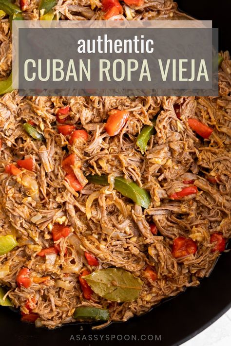 Cuban Ropa Vieja (shredded beef) in a black pan with the words "authentic cuban ropa vieja" in the foreground Cuban Ropa Vieja, Ropa Vieja Recipe, Shredded Beef Recipe, Cuban Recipe, Diners Drive Ins And Dives, Shredded Beef Recipes, Pollo Recipe, Cuban Dishes, Cuban Cuisine