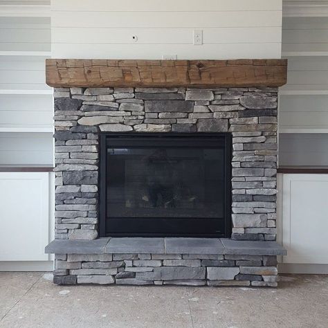 Gray Stacked Stone Fireplaces, Stone Face Fireplace, Types Of Fireplace Stone, Fireplace Dark Stone, Grey Stone Fireplace With Wood Mantle, Short Stone Fireplace, Fireplace Grey Stone, Grey Stacked Stone Fireplace, Light Gray Stone Fireplace