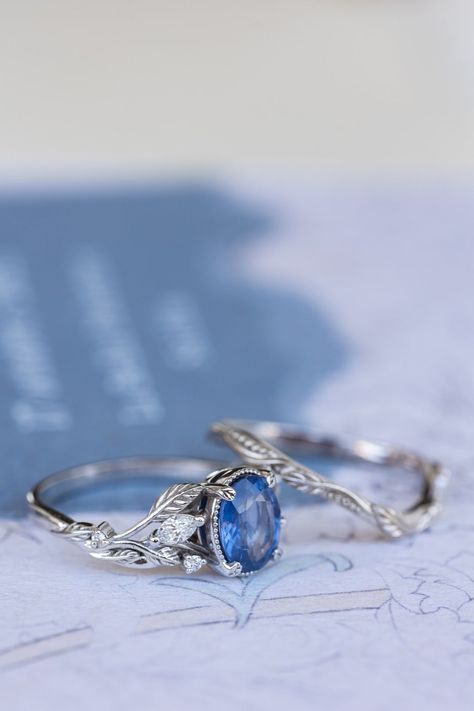 Natural blue sapphire bridal ring set, white gold leaf engagement and wedding rings / Patricia | Eden Garden Jewelry™ White Engagement Ring, Blue Wedding Rings, Floral Wedding Ring, White Gold Sapphire Ring, Beaded Frame, Sapphire Engagement Ring Set, Nature Engagement Ring, Engagement And Wedding Rings, Blue Engagement Ring