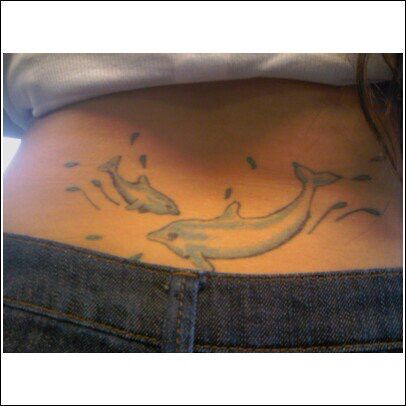 Lol my official #TrampStamp smh I love it #Dolphins #tattoo Dolphin Tale Tattoo, Dolphin Tramp Stamp, Dolphin Heart Tattoo, Celtic Dolphin Tattoo, Dolphin And Mermaid Tattoo, Tramp Stamp, Dolphins Tattoo, Pretty Tattoos, Fish Tattoos