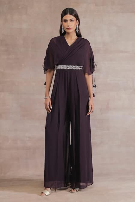 Buy Purple Georgette 60 Gms Embroidered Floral V Neck Pleated Jumpsuit For Women by Seema Thukral Online at Aza Fashions. Jamsut For Women Wedding, Jumpsuits For Women Indian, Gown Western, Function Dresses, Pleated Jumpsuit, Womens Trendy Dresses, Tunic Designs, Jumpsuit For Women, Pattern Dress Women