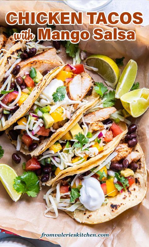 These Chicken Tacos with Mango Salsa are fresh, colorful, and loaded with flavor! Load up tortillas with tender strips of seasoned chicken, black beans, and a super fresh salsa made with sweet chunks of mango and avocado. Chicken Tacos With Mango Salsa, Chicken Avacado, Mango Tacos, Fiesta Lime Chicken, Mango Salsa Chicken, Pulled Chicken Tacos, Tacos With Mango Salsa, Chicken Black Beans, Mango And Avocado