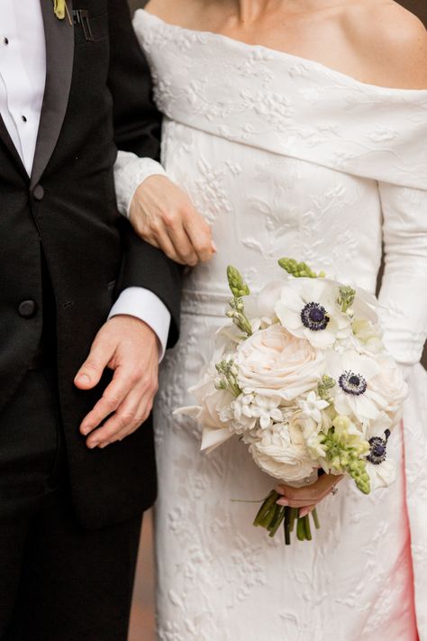 Blossom into wedding day perfection with our bride's bouquet, a stunning fusion of anemone, garden roses, and ranunculus. 🌸👰💐 The delicate petals and rich textures create a bouquet that's both timeless and breathtaking. Discover the allure of floral elegance on your special day! Roses And Ranunculus Bouquet, Aneome Bridal Bouquet, Anemone Rose Bouquet, Peony Ranunculus Anemone Bouquet, Anemone Flower Bouquet Ranunculus, Anenome And Ranunculus Bouquet, Ranunculus Bouquet, Anemone Bouquet, Wedding Bouquets Bride