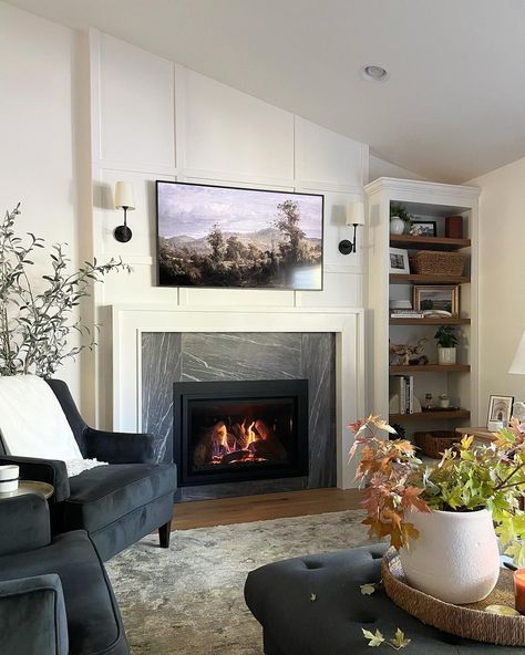 Modern Craftsman Gas Fireplace, Dark Wood Built Ins Around Fireplace, Fireplace With One Window On Side, Off Center Fireplace With Tv On Side, Gas Fireplace Built Ins With Tv, Gas Fireplace Ideas With Tv Above, Marble Gas Fireplace, Builder Grade Fireplace, Modern Traditional Fireplace