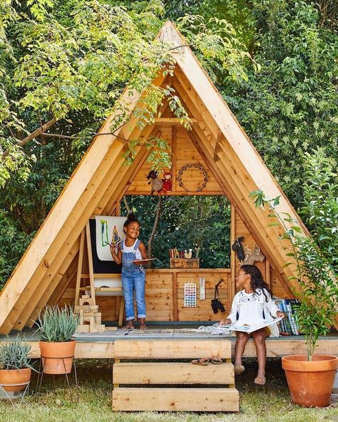 Create the kind of spaces that spark curiosity and adventure! Read more about playhouses in the summer issue of Magnolia Journal!… A Frame Playhouse, Tree House Diy, Diy Playhouse, Backyard Playhouse, نباتات منزلية, Outdoor Play Areas, Tree House Designs, Outdoor Play Area, Playhouse Outdoor