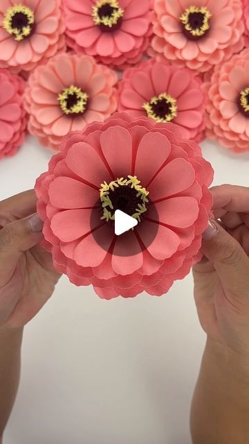 Hey, I’m Judy 👋🏻 Paper Flower Art + Tutorials on Instagram: "Coral paper flower zinnias - a little something to brighten up your day ❤️  My Mini Zinnia template is available in my Etsy shop, link in bio!  ##paperflowers #cricut #teamcricut #cricutcreations #makeitwithmichaels #etsyfinds #handmadewithlove #weddingflowers #paperrose  #paperart #paperzinnia #zinnia #imadethis #diypapercrafts #craftersgonnacraft #makersgonnamake #handmade #etsyfinds #etsyshop #paperflower #weddingbouquet #weddingflowers #weddingflorals #floralarrangement #handmadewithlove #diy" Zinnia Template, Paper Flower Art, Zinnia Flowers, Flowers Paper, Cricut Creations, Paper Roses, Paper Crafts Diy, Pattern Paper, Art Tutorials