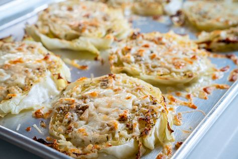 Cheesy Baked Cabbage Steaks | 12 Tomatoes Cheesy Baked Cabbage Steaks 12 Tomatoes, Cheesy Cabbage Steaks, Baked Cabbage Steaks, Cheesy Cabbage, Cabbage Dishes, Lighter Recipes, Baked Cabbage, Cabbage Steaks, 12 Tomatoes Recipes