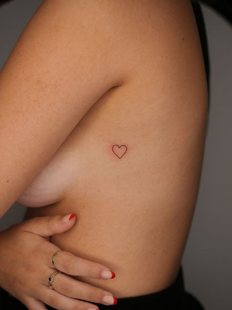 Mini Heart Tattoo Placement, Heart On Back Tattoo, Minimalist Tattoo Heart, Heart Sternum Tattoo, Dainty Heart Tattoo, Heart Tattoo Placement, Open Heart Tattoo, Little Heart Tattoos, Simple Heart Tattoos