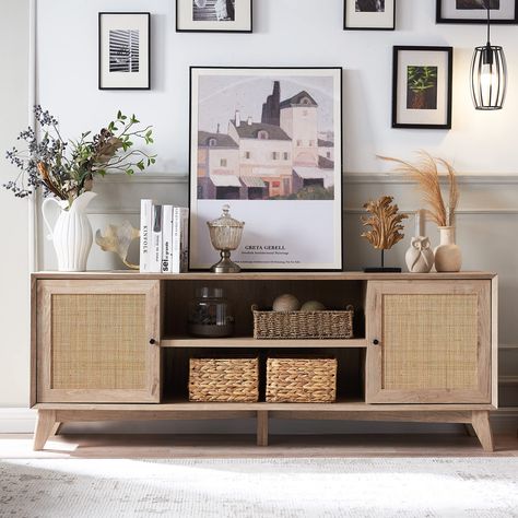 PRICES MAY VARY. Elevate Your Space: Infused with breezy boho-chic vibes by OKD's designers, this media console TV stand seamlessly blends mid-century modern aesthetics with a touch of natural rattan embellishments. Crafted to exude simplicity and elegance, it brings a tranquil, carefree ambiance to any home. Ample & Adaptable Storage: With removable and adjustable shelves in each side cabinet of this entertainment center, tailor your storage to fit media, electronics, books, and more. The 66” w Mid Century Modern Entertainment Center, Shelves Large, 75 Inch Tv, Rattan Door, Television Stand, Wood Media Console, Wood Tv Console, Modern Entertainment Center, Tv Console Table