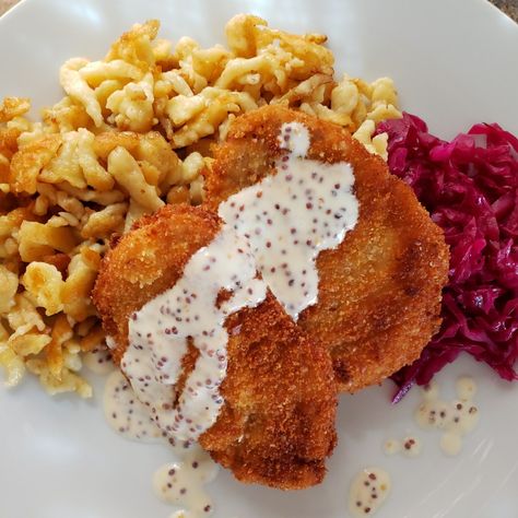 Spätzle and Schnitzel with Tart Red Cabbage and Whole Grain Mustard Sauce #spatzle #spaetzle #schnitzel #oktoberfest #fallfoods #seasonalcooking #holidaycooking #recipes #spatzlerecipe #schnitzelrecipe Spaetzle Sauce, German Schnitzel, Spaetzle Recipe, Whole Grain Mustard, German Food Authentic, Schnitzel Recipes, Soft Pretzel Recipe, Becoming A Chef, Oktoberfest Food