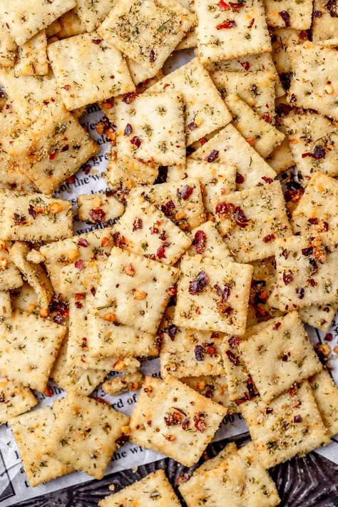 These southern fire crackers are just mini saltine crackers seasoned with olive oil, ranch seasoning, and red pepper flakes for a fun, easy party snack. They're also perfect for movie night or served with your favorite soup or chili. Fire crackers have a bold, zesty, slightly spicy flavor that's seriously addictive! Saltiness Cracker Recipes, Firecrackers Crackers, Crackers Seasoned, Fire Crackers Recipe, Spicy Crackers Recipe, Seasoned Saltine Crackers, Firecracker Crackers, Saltine Cracker Recipes, Spicy Crackers