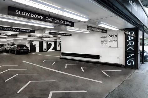 Signage as backseat driver: typography throughout the building directs drivers what to do and where Park Signage, Sign System, Wayfinding System, Signage System, Environmental Graphic Design, Parking Signs, Wayfinding Signage, Parking Design, Parking Garage