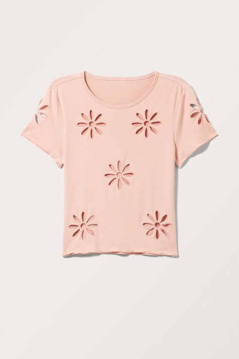 A cropped short-sleeve top with flower cut-outs crafted from a stretchy recycled polyester jersey. It features a round neckline, short cap sleeves, and a straight hemline. Slim fit.Cropped length.Round neck.Cut-out details.Straight hem. Light Dusty Pink, Flower Cut Out, Cut Out Top, Cut Outs, Dusty Pink, Round Neckline, Cap Sleeves, Short Sleeves Tops, Sleeve Top