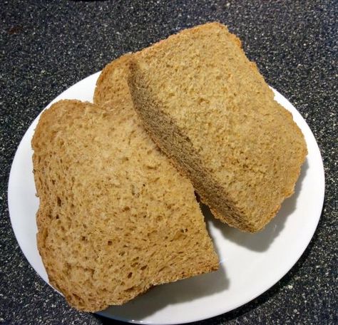 New England Anadama Bread (for Bread Machines) Recipe  I made a 2 lb loaf. I substituted 2c whole wheat flour for an equal amt of regular flour; substituted 1c milk for water, omitting the milk powder; and added another 1/2c of water to make a smooth dough. Came out just perfect! Dill Bread, Anadama Bread, Cornmeal Bread, Homemade Bread Loaf, Bread Making Machine, Bread Machines, Cinnabon Cinnamon Rolls, Bread Maker Recipes, Bread Makers