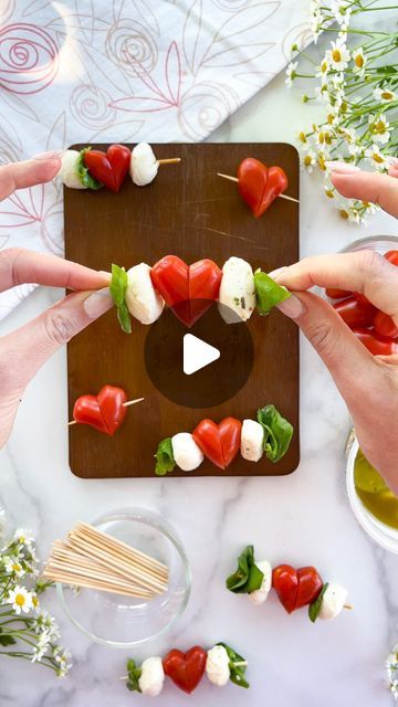 Alaura Berry on Instagram: "Caprese Heart Skewers ❤️🍡  This Valentine’s Day twist on caprese skewers is perfect for: • Adding to your cheese board • Serving on their own with a drizzle of balsamic • Adding to your sweeties lunch to show them a little extra lovin’   All you need is:  • cherry tomatoes  • mozzarella balls  • basil  • 4 inch skewers   When picking out your cherry tomatoes, look for tomatoes that are a little bit longer and be sure to cut them in half at a diagonal!   Don’t like tomatoes? Swap them out for strawberries 🍓🥰" Heart Caprese, Caprese Salad Skewers, Caprese Bites, Caprese Skewers, Baby Tomatoes, Tomato Mozzarella, Valentine's Day Recipes, Valentines Food, 2024 Christmas