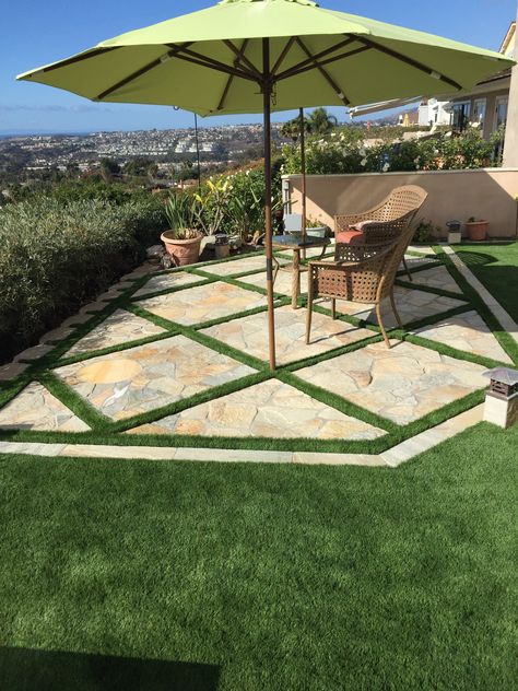 The modern look of artificial grass laid between pavers has become a popular look. What do you think? Grass Between Pavers, Pavers Ideas, Diy Artificial Turf, Turf Landscaping, Artificial Turf Landscaping, Modern Yard, Artificial Grass Backyard, Grass Pavers, Installing Artificial Turf