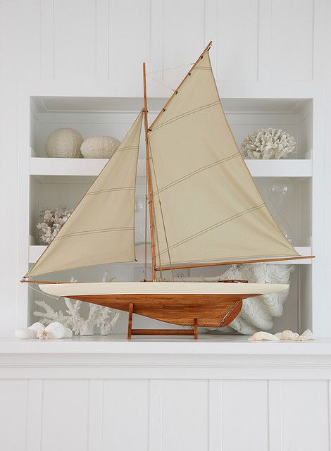 Just beautifully simply, and classic nautical. Something about adding a model sailing ship instantly classic decor Sailboat Model, Pond Yachts, Deco Marine, Model Sailboat, Cottage By The Sea, Beach House Style, Wooden Ship, Beach Cottage Style, Beach Living