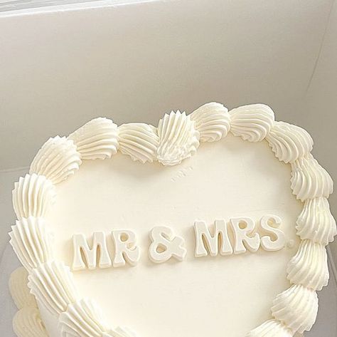 Baked by Julie | West Covina, CA on Instagram: "Mr & Mrs 🤵🏻‍♂️👰🏻‍♀️ • • • • #mrandmrs #whitecake #justmarried #weddingcake #weddingcakes #wedding #weddings #weddingseason #weddingseason2023 #lambeth #lambethcakes #lambethcake #vintage #vintagestyle #vintagecake #vintagecakes #buttercreampiping #cake #cakes #cute #cakelove #lacounty #cakesofinstagram #cakestagram #westcovina #supportsmallbusiness #626 #bakedbyjulie_ #customcakes #foodphotography" Mr And Mrs Aesthetic, Pink Vintage Wedding Cake, M&s Wedding Cake, Wedding Cake Writing, Wedding Cake Heart Shape, Rome Editorial, 1 Year Anniversary Cake, Wedding Cake Heart, Just Married Cake