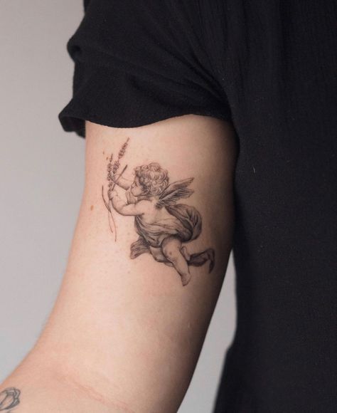 Cherub Tattoo Arm, Cherub Holding Flowers Tattoo, Greek Tattoos Aphrodite, Realistic Cherub Tattoo, Cherub With Flowers Tattoo, Angel Statue Tattoo, Victorian Tattoo Ideas, Cherub Angel Tattoo, Cherub Tattoo Designs