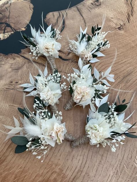 Dried flower buttonholes are perfect for ordering in Advance, or taking abroad for your wedding. They are made onto a plastic clip with a metal fixing and tied together so that they are extremely secure for your wedding day. Dried flowers  buttonholes Are everlasting if they are cared for correctly. This style contains eucalyptus, white Ruscus, preserved Gypsophelia, White bunny tails, and preserved flowers. Sizes vary from adults and child's so please use the drop down to select your sizing. Ch Dried Flower Button Holes, Button Holes Wedding, Dried Hydrangeas, Corsage And Boutonniere, Wedding Suits Groom, Wedding Info, Small Rose, Button Flowers, How To Preserve Flowers