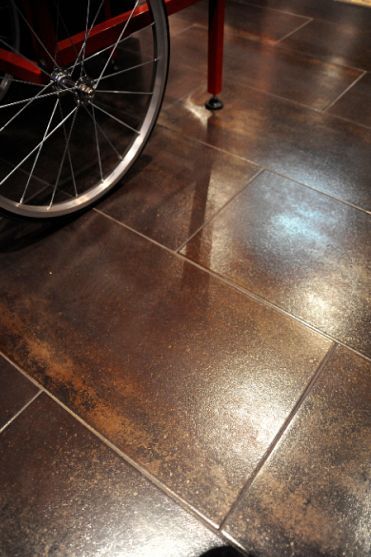 flooring is porcelain, 12X24 tiles in graphite, depending on where you're standing you can see hues of grey metal, chocolate brown, shimmery copper Copper Floor Tile, Brown Floor Tile, Bronze Tiles, 12x24 Tile, Brown Tile, Copper Tiles, Wall Paneling Diy, Wooden Chopping Boards, Metal Tile