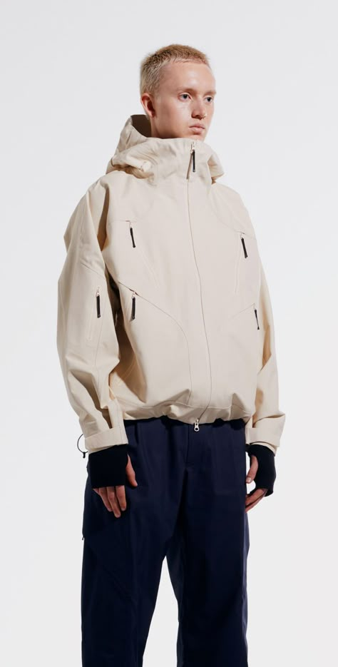 Shell jacket and knit top and trousers Goldwin 0 Studio Wardrobe, Mens Rain Jacket, Monochromatic Fashion, Mens Outdoor Jackets, Men's Windbreaker, Sports Performance, Constantly Evolving, Futuristic Fashion, Outdoor Jacket