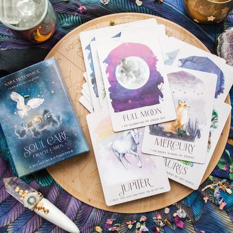 Looking for cosmic insight? 🌟 Are you searching for cosmic guidance on your life journey? Look no further, because we've got just what you need! Introducing the Soul Care Oracle Deck - your ultimate guide to rediscovering your inner self and unlocking the secrets of the universe. 🌠 This magical deck was carefully crafted by Sara McCormick, the astrologer behind Bella deLuna Astrology, and it corresponds with the bestselling Soul Care Planner. It features an exquisite collection of 36 cards that are deeply inspired by planets, moon phases, zodiac signs, elements, and all things celestial. 🌙 As you explore the world of tarot and oracle cards, you'll find comfort in knowing these cards can be utilized for various purposes such as pulling a daily card or even creating your very own spreads! Self Care Tarot, Magnetic Book, Soul Care, Astrology Tarot, Tarot Card Spreads, Learn Astrology, Tarot Astrology, Secrets Of The Universe, Lunar Cycle