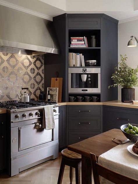 Beautiful kitchen with gray cabinets paired with cream countertops over herringbone wood floor. ... Corner Kitchen Cabinet Ideas, Kitchen Corner Units, Kitchen Corner Cabinet, Corner Cabinet Solutions, Corner Storage Cabinet, Corner Kitchen Cabinet, Comfortable Kitchen, Kitchen Cabinets Makeover, Kitchen Corner