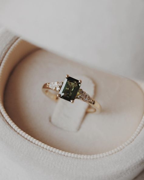 Congratulations Quin + Rae 🥹💍🍾 We customized our Elsie setting, switching out the centre stone for a stunning 6x4mm natural dark green tourmaline with pear and round accents. We wish you the best for your engagement season!! Engagement photos by the lovely: @jordanfayephotography Dark Green Engagement Ring, Olive Branch Jewelry, Green Wedding Rings, Old New Borrowed Blue, Green Engagement Rings, Engagement Season, Beautiful Baubles, Ring Inspo, Future Engagement Rings