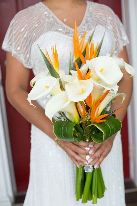 Bird of Paradise and Calla Lilly bridal bouquet. Wedding inspiration Birds Of Paradise Bridal Bouquet, Wedding Tropical Bouquet, Bird Of Paradise Wedding Bouquet, Birds Of Paradise Wedding Bouquet, Birds Of Paradise Bouquet, Bird Of Paradise Bouquet, White Lily Bouquet, Tiki Wedding, Bird Of Paradise Wedding